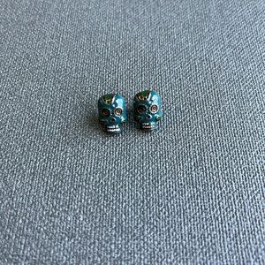 Francesca’s blue skull earrings